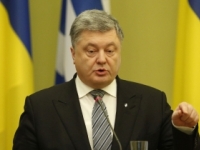 Porošenko: Voľby v Donbase nemôžu byť v prítomnosti Rusov 